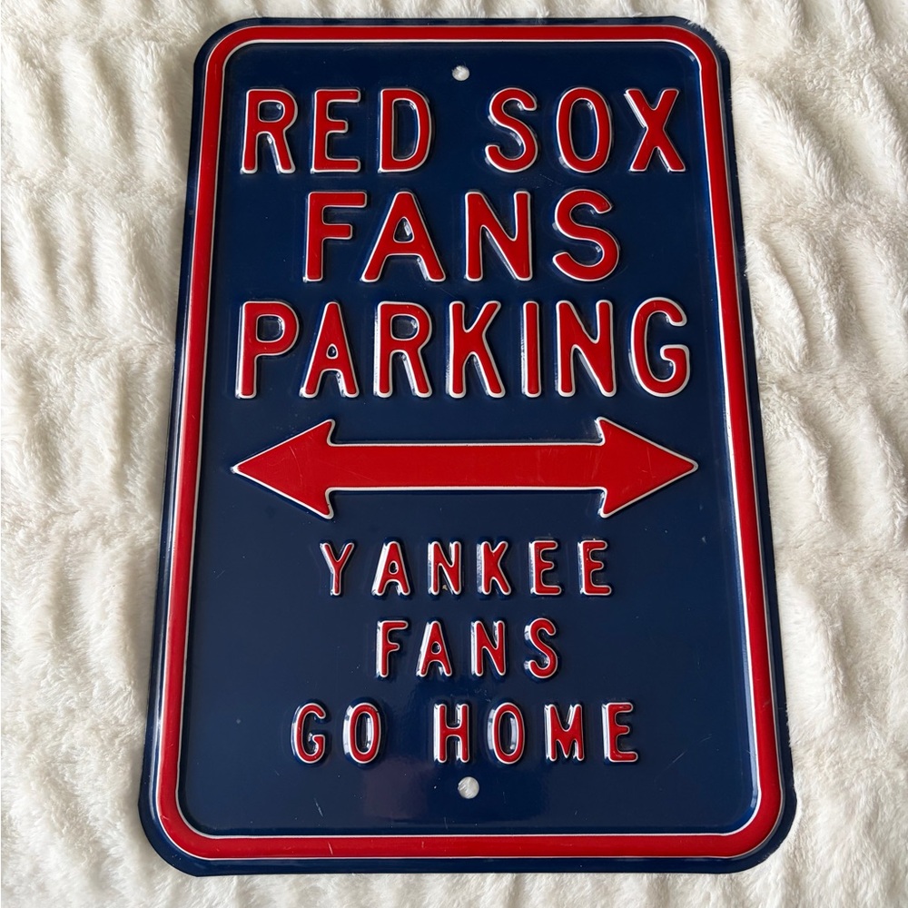 Red and Blue Metal Sign for Fans